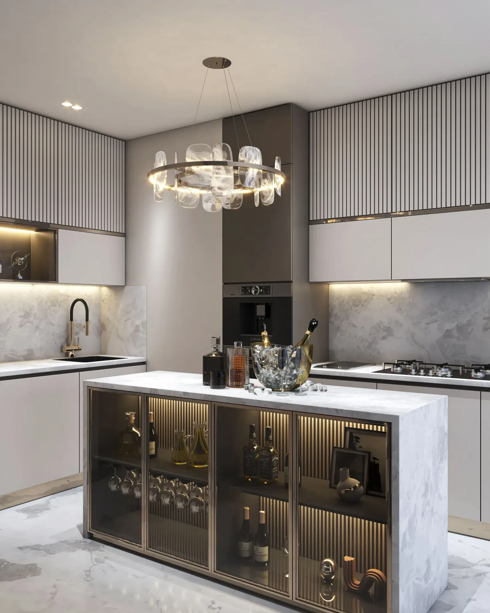 Kitchen Interiors — a modular kitchen in fluted grey and white stone under a ring chandelier