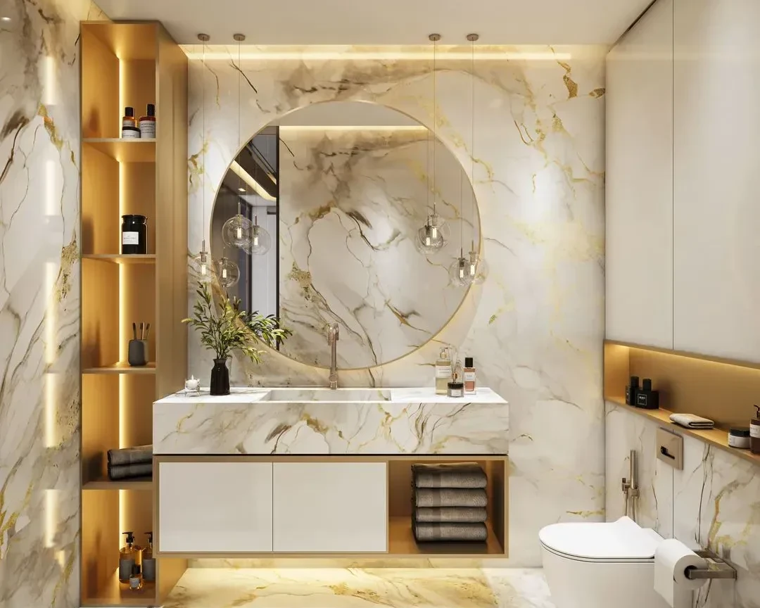 Marble, brass and a backlit mirror in a director’s cabin washroom